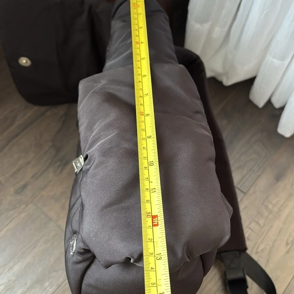 Bearpaw Puffer Flap Top Snap & bungee pull,side zip pockets,padded laptop sleeve